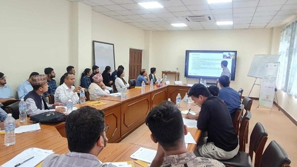 Mr. Bigyan Babu Regmi presenting at the academic workshop